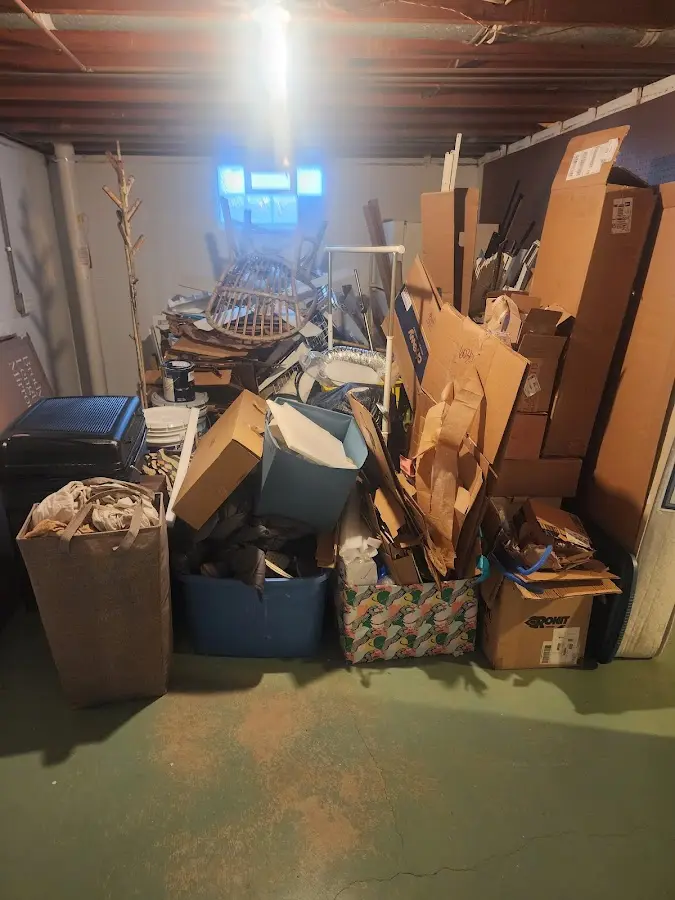 Roll-off dumpster container at job site for Yard Waste Dumpster Rental in Alaiedon